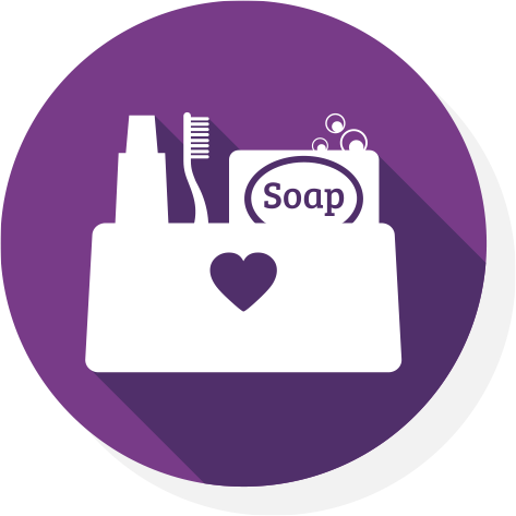 a white icon of a bag of toiletries on purple background